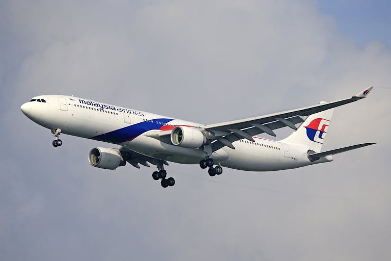 Airplane Flying in Sky
